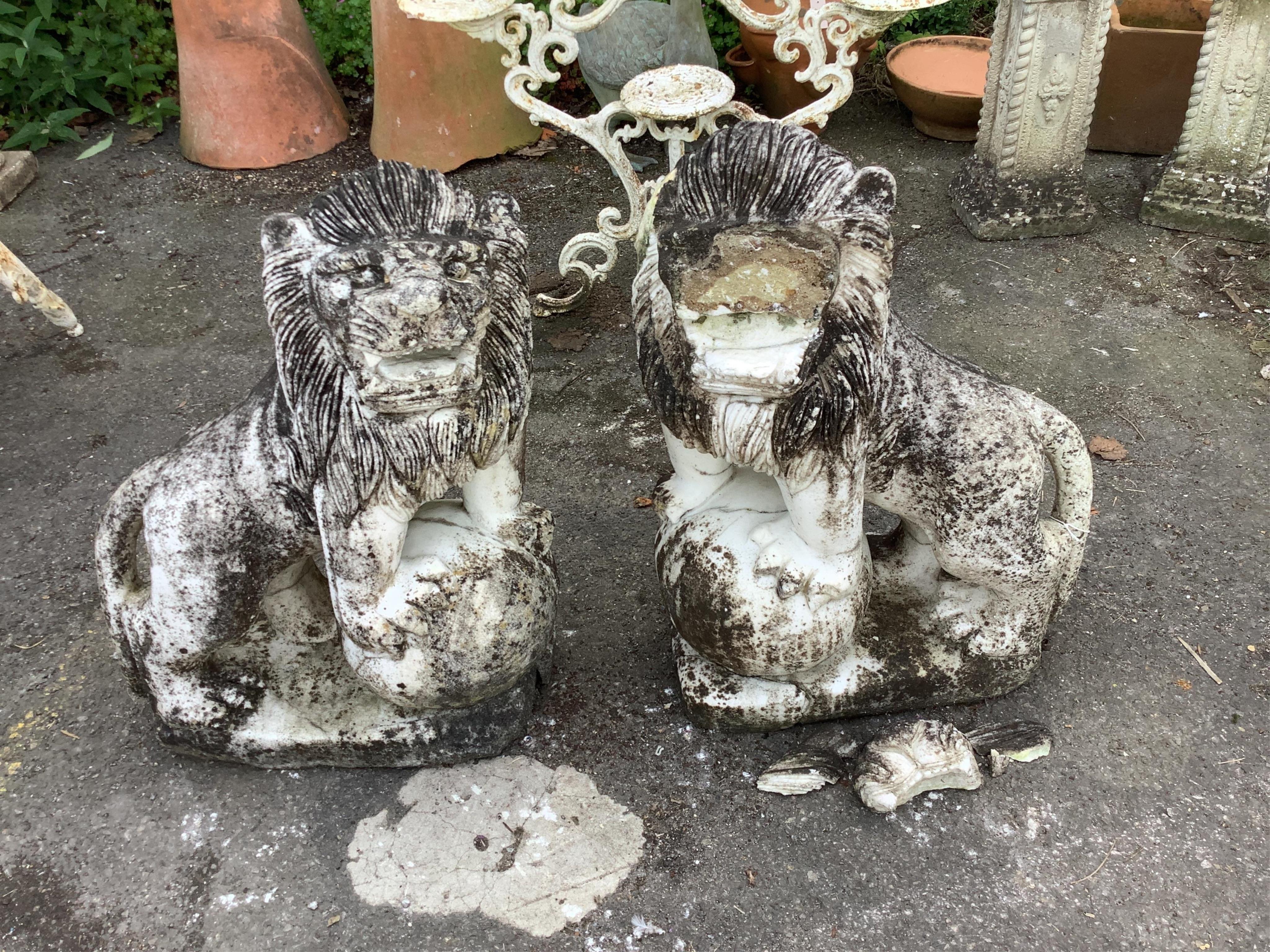 A pair of Chinese style reconstituted white marble models of kylin, (one in need of repair), height 71cm